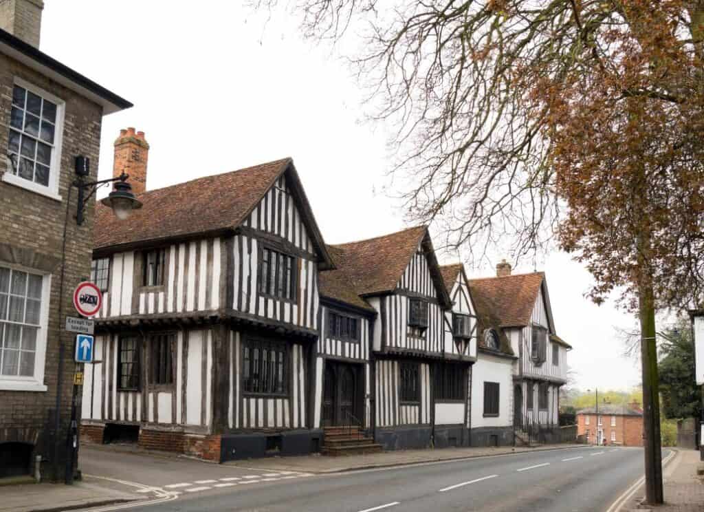 a row of traditional old half-timbered buildings in the picturesque town of Sudbury in Suffolk, UK